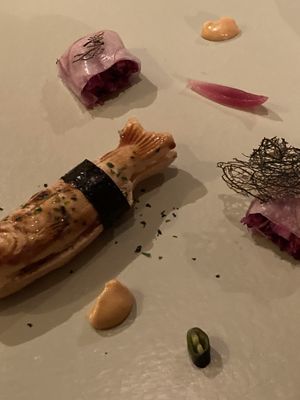 red cabbage rolls and a fish made from rice with potato filling  at Vegan French Restaurant L'Espéranceレスペランス in Sapporo