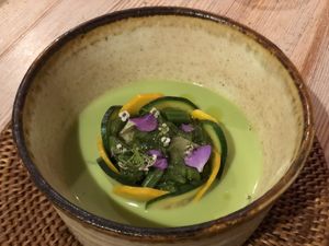 1st course: Pea soup with courgette slices, wild fern and edible flowers  at Vegan French Restaurant L'Espéranceレスペランス in Sapporo