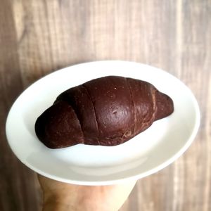 This chocolate chip filled chocolate bun is so good! at Loving Nature Fortunate Coffee Cafe in Central Singapore