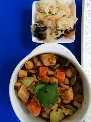 With pickles and main stewed dish at Loving Nature Fortunate Coffee Cafe in Central Singapore