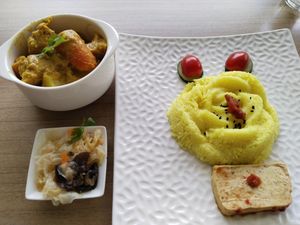 Lions mane rendang with turmeric basmati rice $6.80 + $0.50 at Loving Nature Fortunate Coffee Cafe in Central Singapore