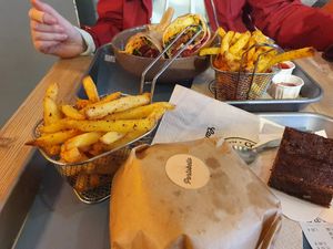 Visible are fries, brownie and energy wrap at Copper Branch - Rue de Rennes in Paris