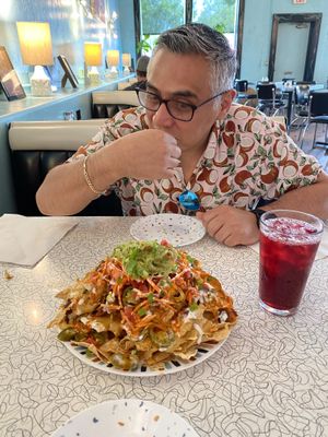 The spicy Buffalo chik’n  nachos were great and huge. Between the two of us we could not eat them all and were full!!  at Spiral Diner & Bakery in Fort Worth