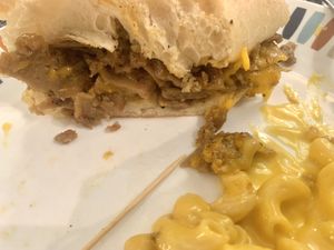 Philly Cheesesteak & mac n cheese  at Spiral Diner & Bakery in Fort Worth