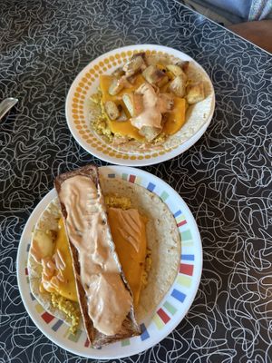 Breakfast tacos with chipotle mayo! (Top: potato, bottom: bacon) 100/10!  at Spiral Diner & Bakery in Fort Worth