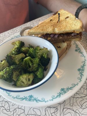 Patty melt w/ side of broccoli   at Spiral Diner & Bakery in Fort Worth