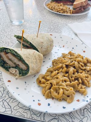 Chicken Parmesan wrap. Great flavor. Didn’t care for Mac. & cheese   at Spiral Diner & Bakery in Fort Worth