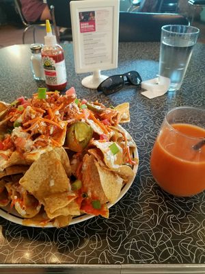 buffalo nachos with carrot juice at Spiral Diner & Bakery in Fort Worth