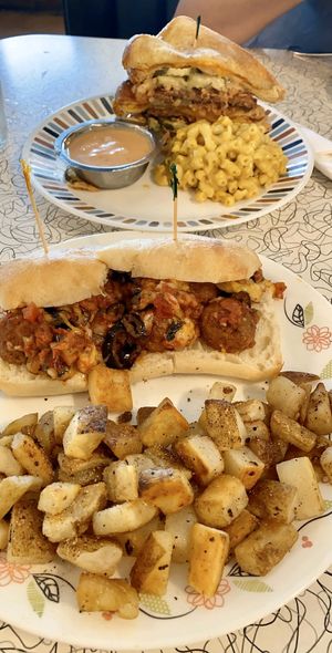Triple Double with mac and cheese side. Meatball sub with homefries at Spiral Diner & Bakery in Fort Worth