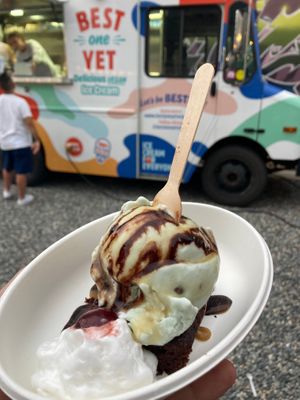 Mint chip on a brownie with a cherry on whipped cream and a chocolate drizzle. at Best One Yet in Boulder