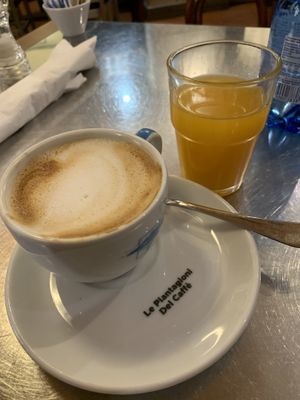 Oat milk cappuccino and freshly squeezed orange juice   at Ben Caffè in Florence