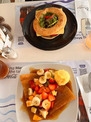 vegan bagel and vegan, gluten free crepe with fruits and sorbet at Chocolat Cafe Creperie in Naxos