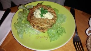 Zucchini and carrot fritters with curry, hummus with lemon and coriander at Les Amants du Marche in Pau