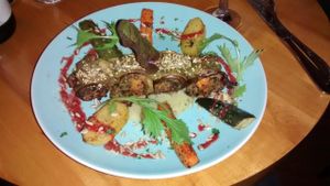 Rolled eggplant with green lentils, sweet potatoes, olives, baked with coconut sauce chard, parsnip puree with 'bear' garlic and roasted vegetables with balsamic at Les Amants du Marche in Pau