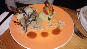 Samosas stuffed with chickpeas, pumpkin, zucchini, black salsify, dates and raisins, basil and fennel sauce, couscous with avocado and cucumber at Les Amants du Marche in Pau