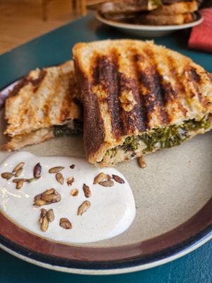 Grilled cheese au kale et sauce tofu at Café des Habitudes in Montreal