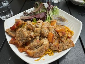Vegan roast pork belly with garlic noodles  at Banh Mi Up in Portland