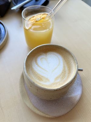 Flat white with oat milk, orange juice  at Br00m44 in Zagreb