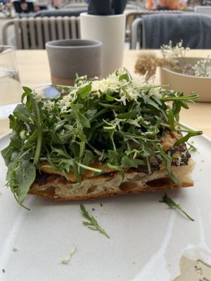 FORREST TOAST

warm focaccia topped with sweet potato cream & pickled lemons, mushrooms, arugula and chestnut  at Br00m44 in Zagreb