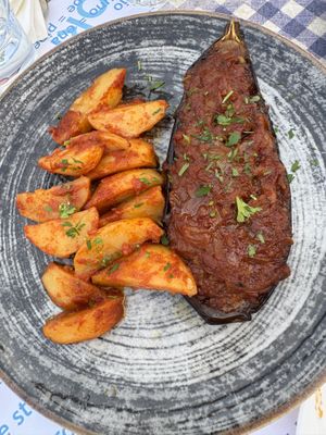 Aubergine with caramelised onions and potatoes 🍆 🥔  at Taverna Sapori Greci in Trieste