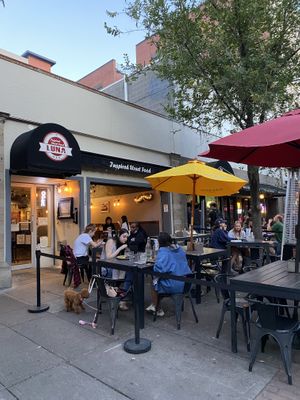 Outdoor and indoor seating at Luna’s at Luna Inspired Street Food in Ithaca