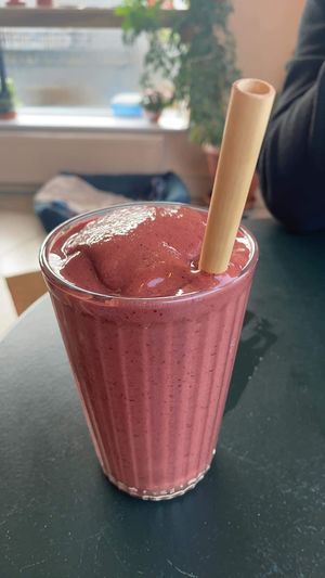 Cherry, cacao and date smoothie, hands down the bestie smoothie I've ever had ! Cute bamboo straw too !  #Veganuary at Nourish Plant Kitchen in Harrogate