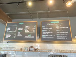 8/2022 menu Yummy 😋 1) small Breakfast Sandwich on biscuit 5/5 ⭐️ 2) Club vegan 5/5 ⭐️   at Karma Cream in Gainesville