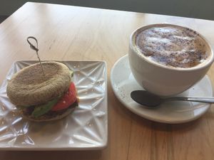 Breakfast sandwich and soy latte  at Karma Cream in Gainesville