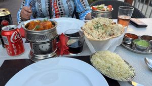 Chana masala, Bombay potato, garlic rice and garlic naan. Very tasty and very filling at The Curry House in Benidorm