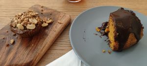 Peanut butter cookie on left and carrot cake on the right. at Tataoim in Lisbon