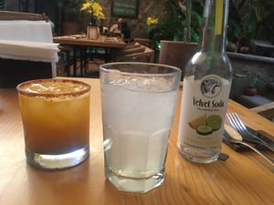 Passion fruit/mezcal cocktail, plus a lemon/cucumber velvet soda at Tata Mezcaleria in Morelia