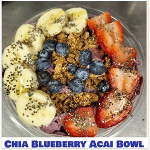 Blueberries, Acai,  banana,  cinnamon,  vanilla pea/hemp protein, Almonds, Coconut water, topped with granola, banana and fresh berries at Love Café in South Hill