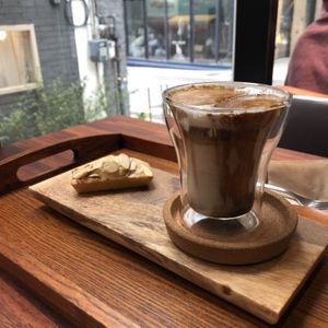 With a financier  at Coffee Doga Heritage - Ehwa branch 커피도가 헤리티지 이화점 in Seoul