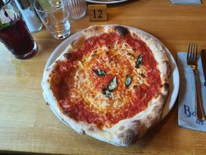 Delicious Pizza Neapolitana with vegan cheese at Bottega No. 13 in Neustift Im Stubaital