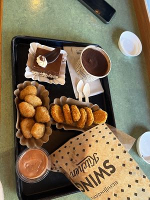 Burger, nuggets, cheese bites, tiramisu, chocolate cake and drinks!  at Swing Kitchen - Universitätsring in Vienna