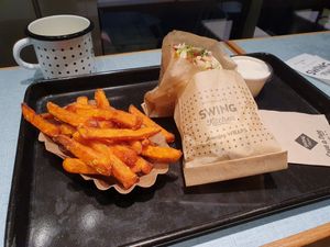 Sweet potato fries and Swiss wrap at Swing Kitchen - Universitätsring in Vienna