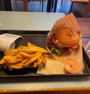 bacon burger with fries and barbecue sauce   at Swing Kitchen - Universitätsring in Vienna