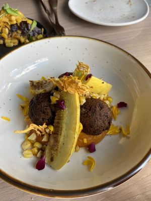 Three Sisters Fritter (dinner special) - so tastey and different from the other three sisters corn sandwich, it’s spicy!   at Owamni by The Sioux Chef in Minneapolis