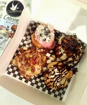 Cinnaholic Gourmet Cinnamon Rolls: Tropical Bliss, Cookie Monster, S'more, Apple Pie - about $8 each (all vegan! Mmmmm) at Cinnaholic in Victoria