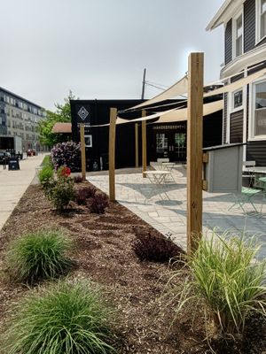 Outside the cafe, including seating area at Ugly Duck in Rochester
