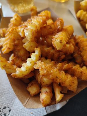 Fries with spicy seasoning at VINCENT - Hauptbahnhof Hamburg in Hamburg