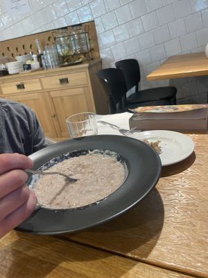 Porridge with fresh strawberry jam my kid mixed in...  at Kohvik Muna in Narva