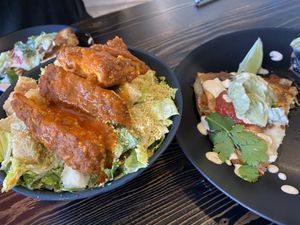 Buffalo Caesar salad and chicken quesadilla ￼  at PlantPub in Cambridge