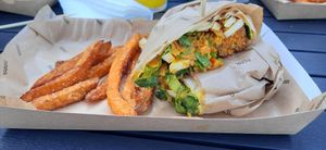 Vegan burrito with smoked tofu and falafel at Forum Przestrzenie in Krakow