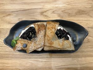 Pancakes with blueberry jam (good but not spectacular)  at Good Food Bowl in Moscow
