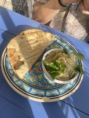 Tomato hummus with bread at Hamsa in Krakow