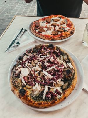 Vegan pizza Rosso and vegan pizza bianco — very yummy   at Chicago Trattoria in Brussels