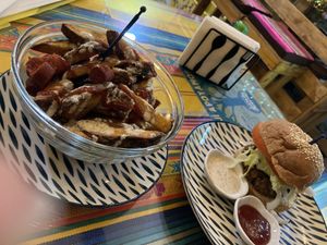 Salchipapas and hamburger   at AMA la Jama in Guayaquil