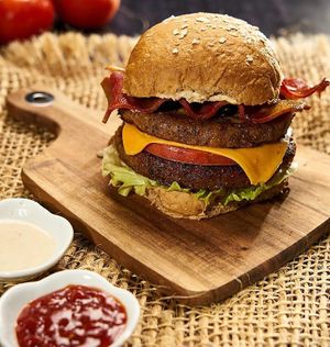 burger with toppings at AMA la Jama in Guayaquil