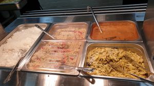 Rice, nasi gorgen, butter chick'n and yellow curry at Vegie Tribe in Melbourne